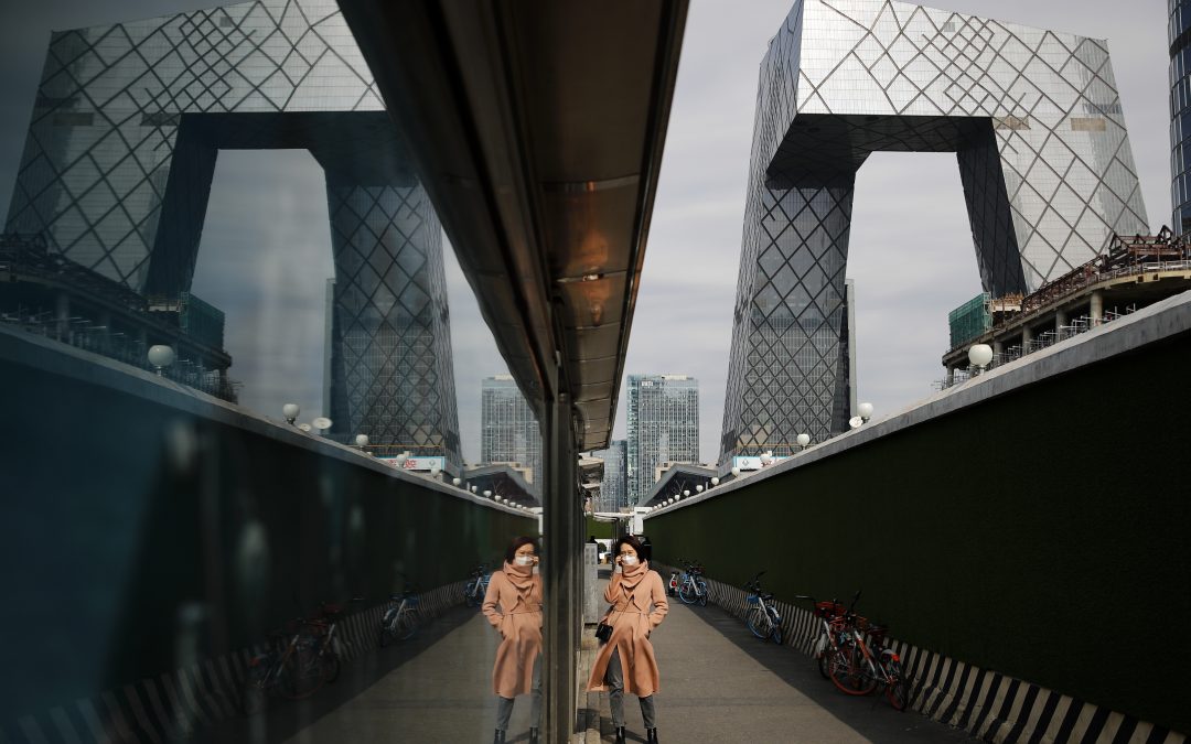 World economy may shrink because of virus, watchdog says