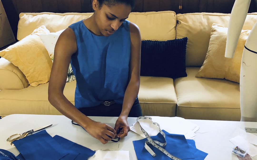 Volunteers sew masks for health workers facing shortages