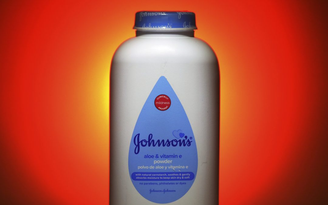 J&J slashes outlook, races to develop coronavirus vaccine