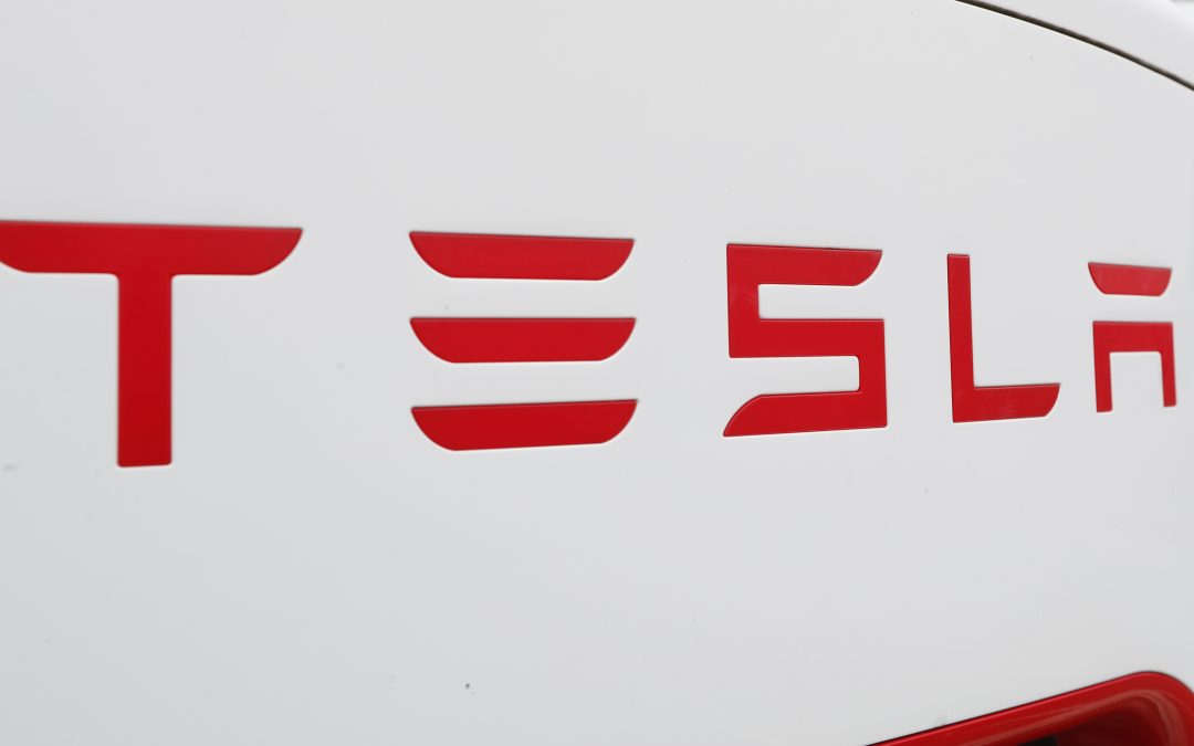 Tesla ekes out small 1Q net profit, surprising Wall Street
