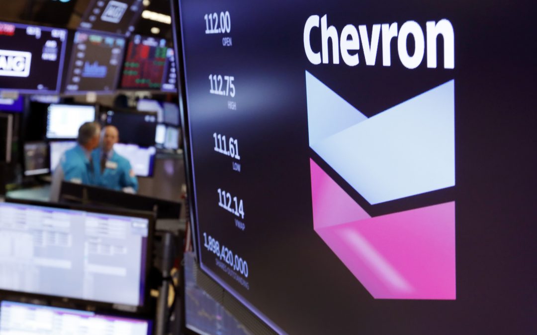 Chevron turns a profit but warns of pain ahead
