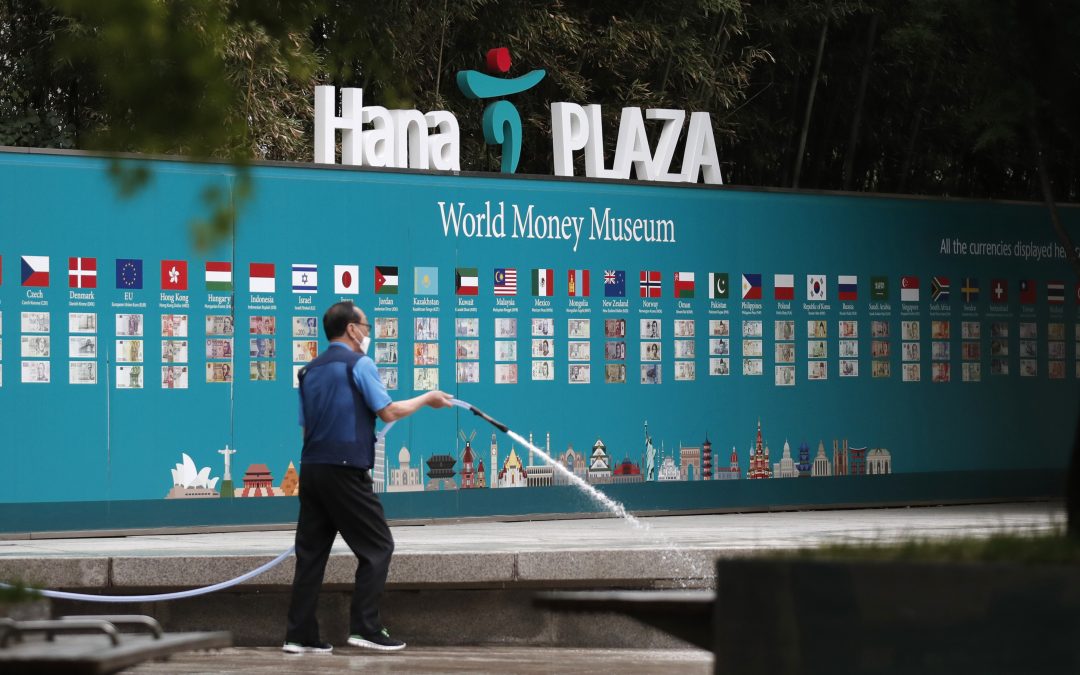 Wall Street drops after reopening worries lead to late slide