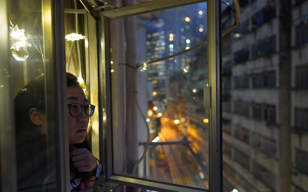 VIRUS DIARY: In Hong Kong lockdown, watched by a wristband