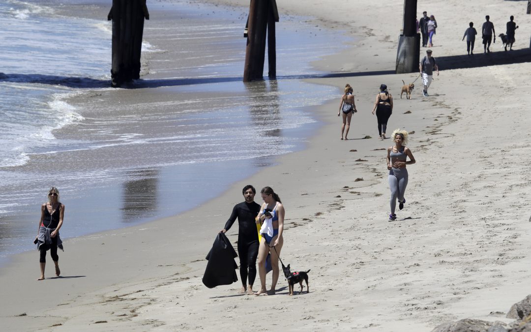 Surf’s up and so are new beach rules to prevent virus spread