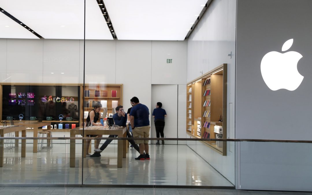 Apple re-closes some stores, raising economic concerns