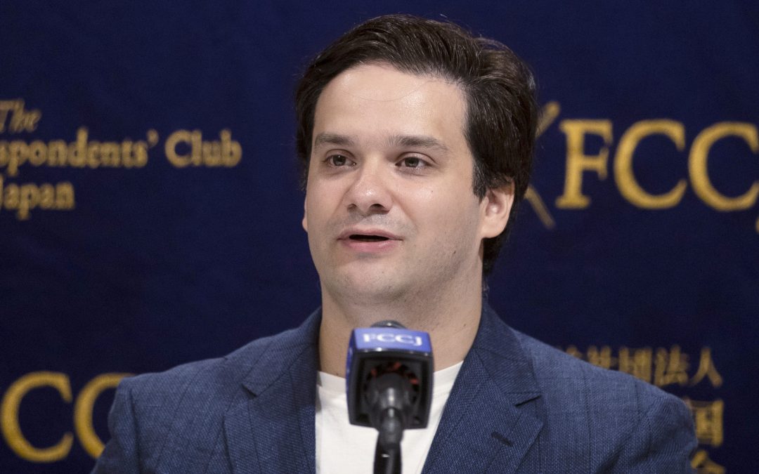 Japan court backs Karpeles conviction for data manipulation