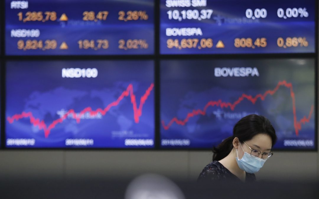 Stocks vault higher, as Nasdaq hits record on economy hopes