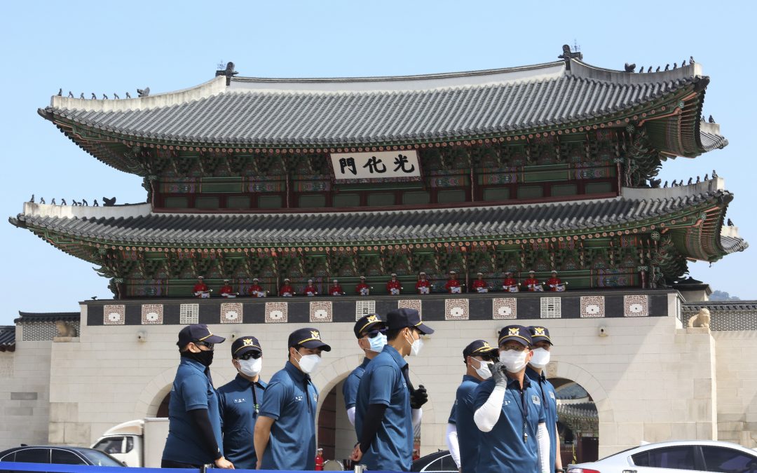 Asia Today: Beijing reinstates virus controls as cases rise